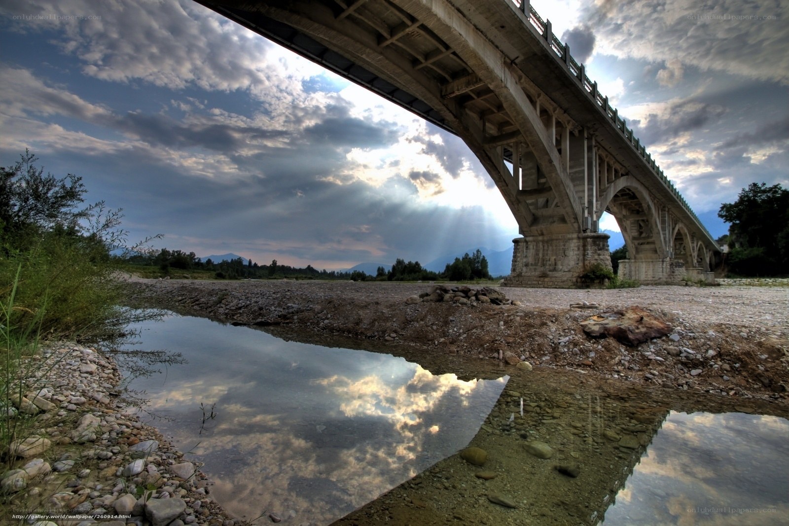 Bridge over a river at sunset