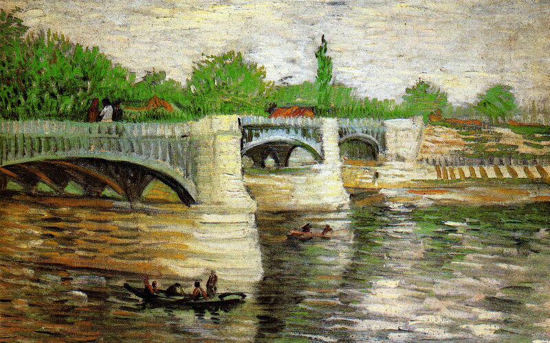 Bridge over a river with boats