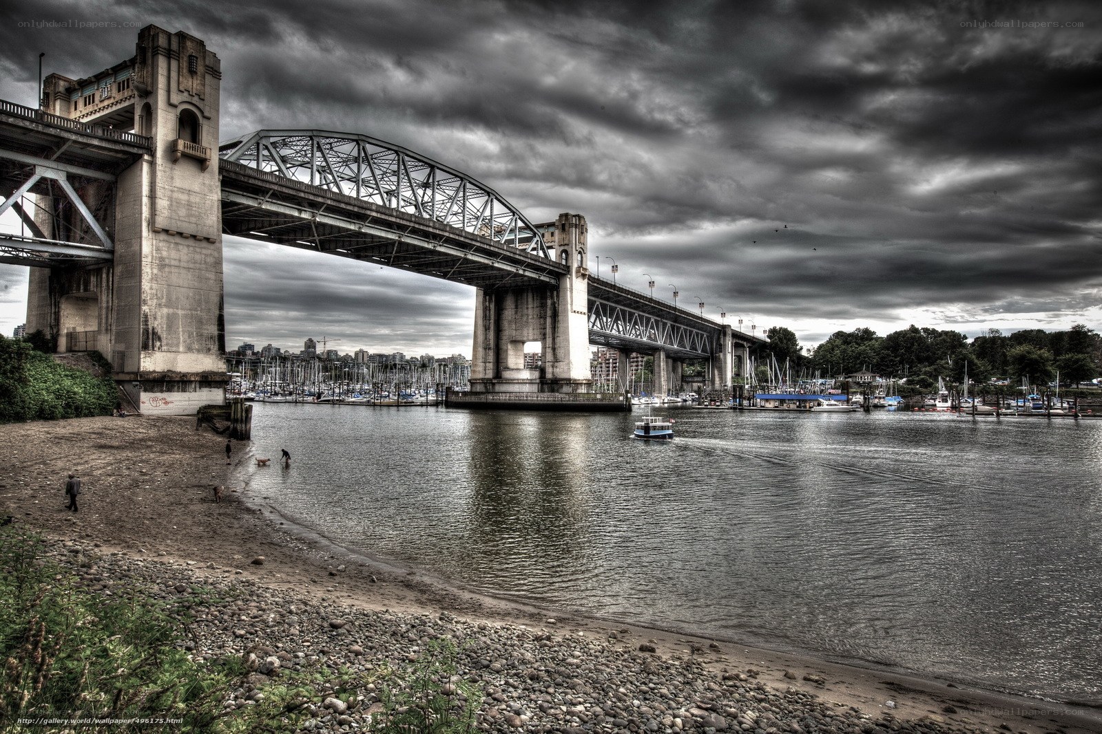 Bridge over a river with boats