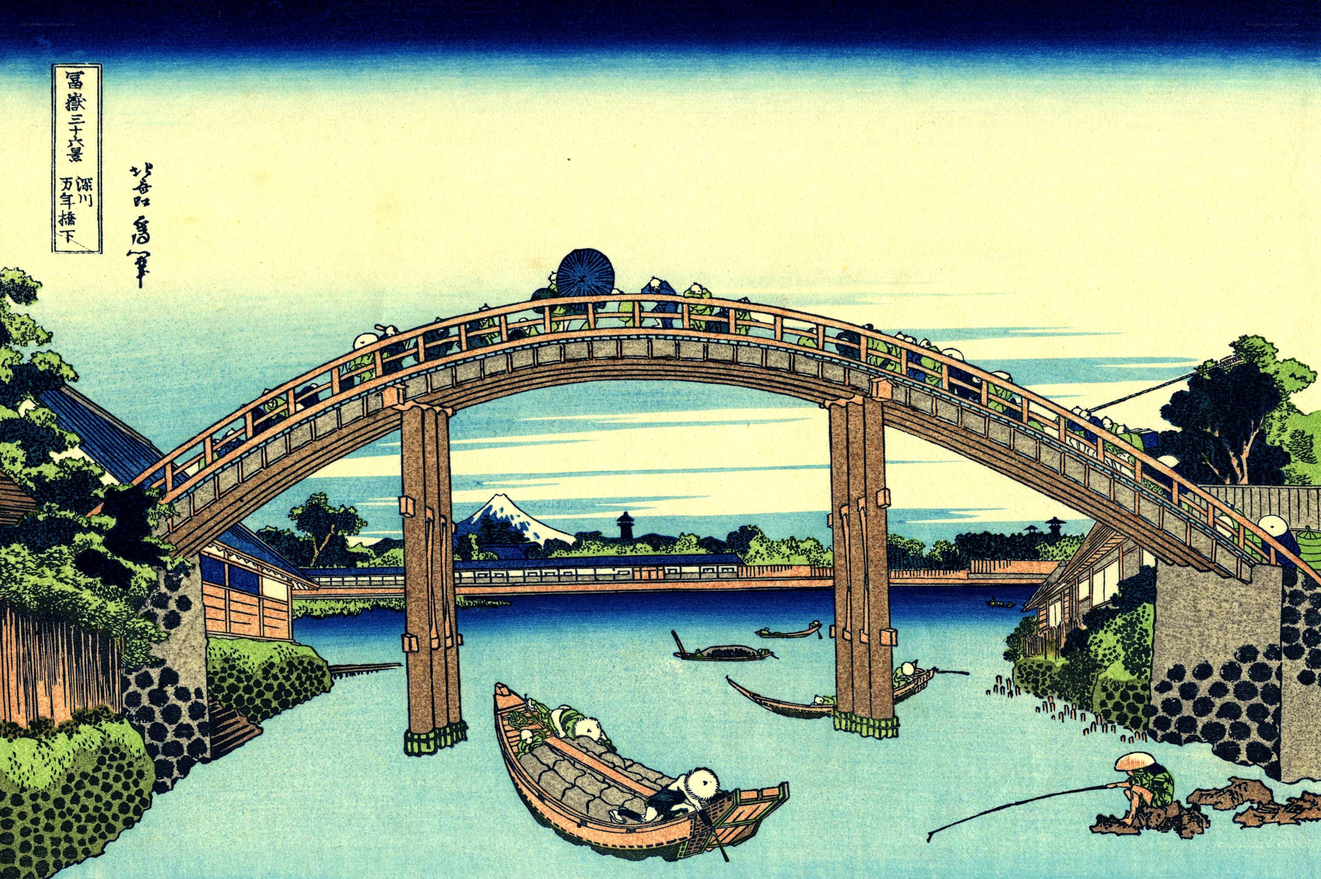 Bridge over a river with Mount Fuji