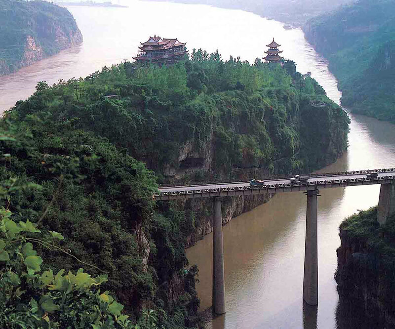 Bridge over a river with temples