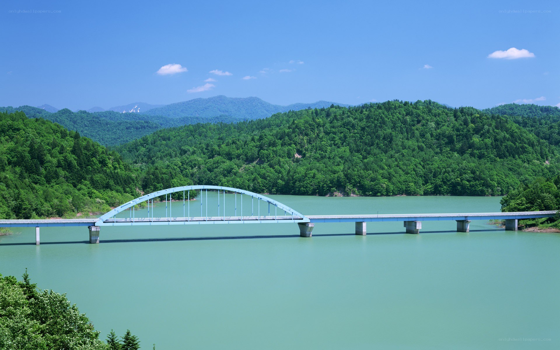 Bridge over a turquoise lake