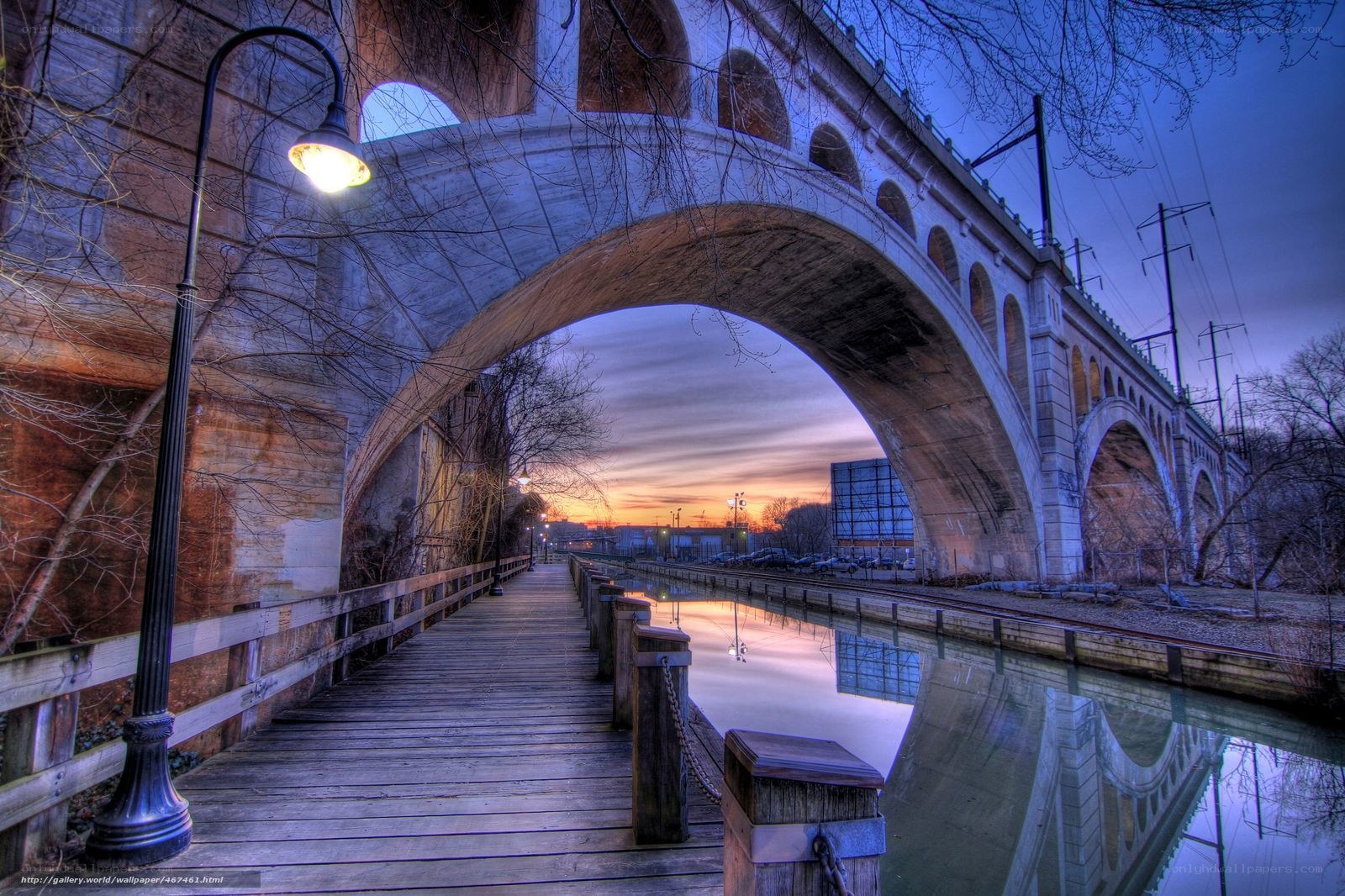 Bridge over canal at sunset