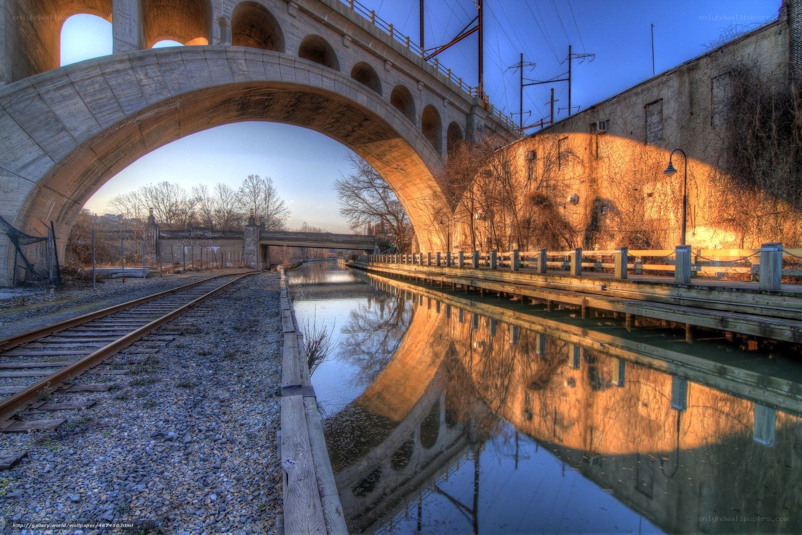 Bridge over canal at sunset