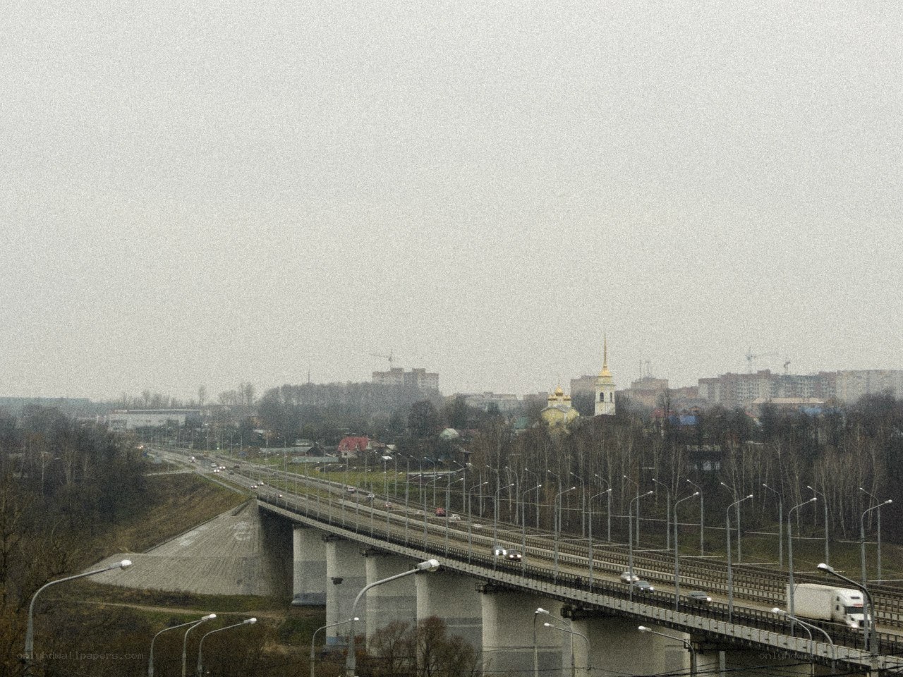 Bridge over city with church