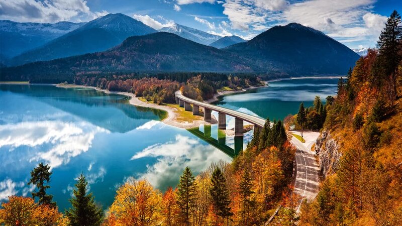 Bridge over Lake in Mountains