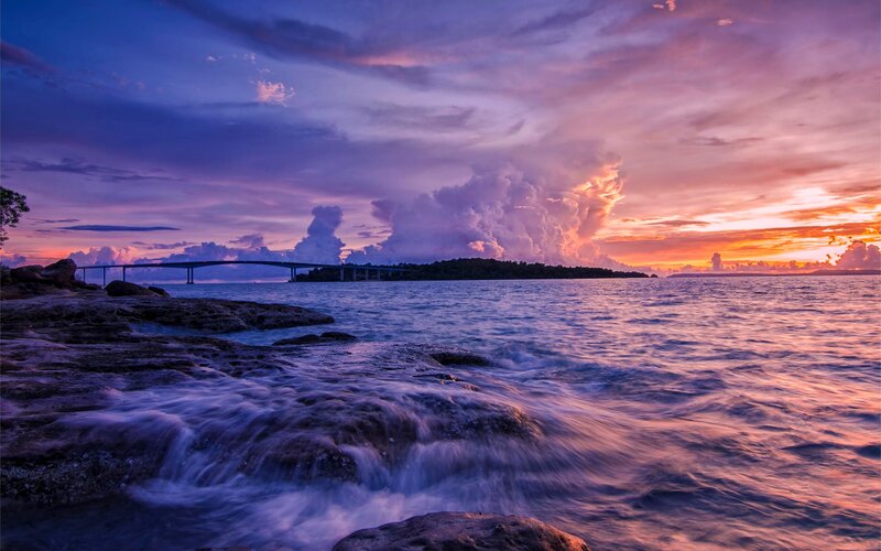Bridge over Ocean at Sunset