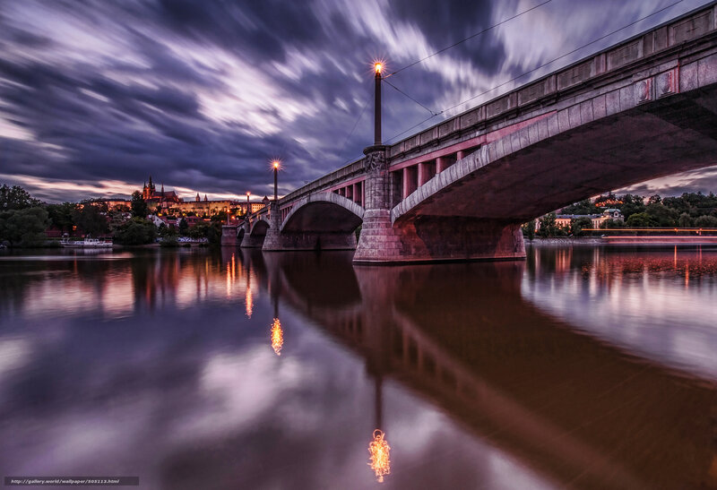 Bridge over river at dusk