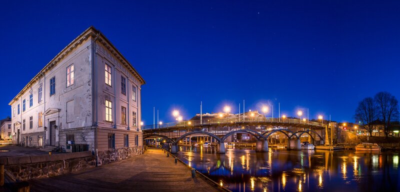 Bridge over River at Night — Blue, Serene, Photograph, Building, Boats