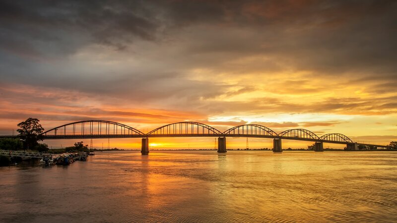 Bridge over River at Sunset — Orange, Dramatic, Photograph, Sky