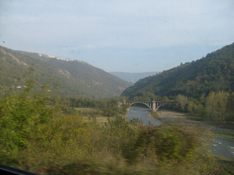 Bridge over river in valley