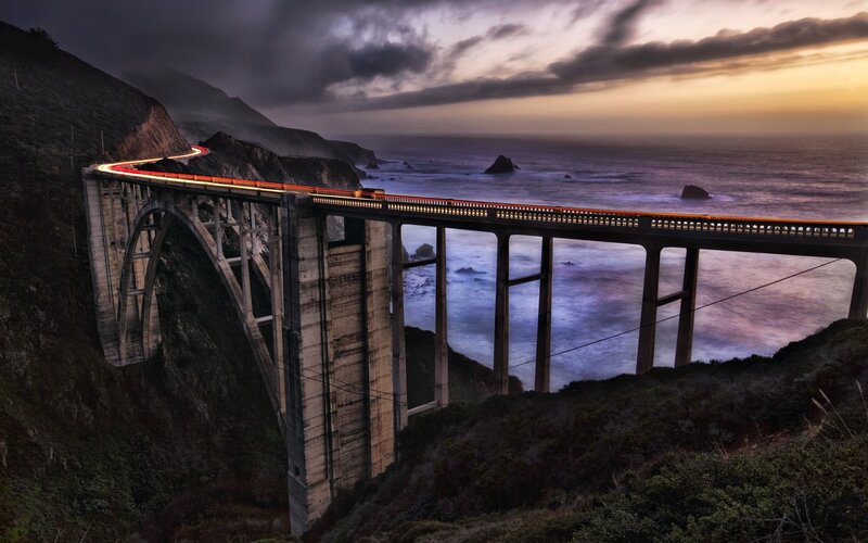 Bridge over the ocean at dusk