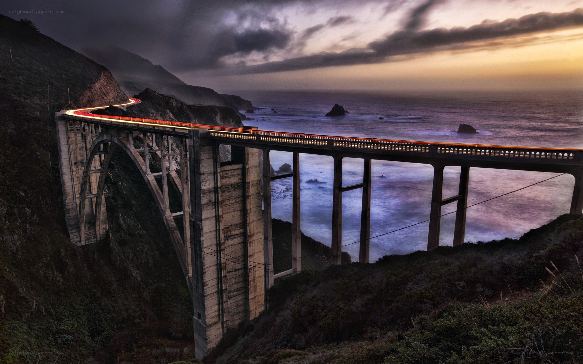 Bridge over the ocean at dusk