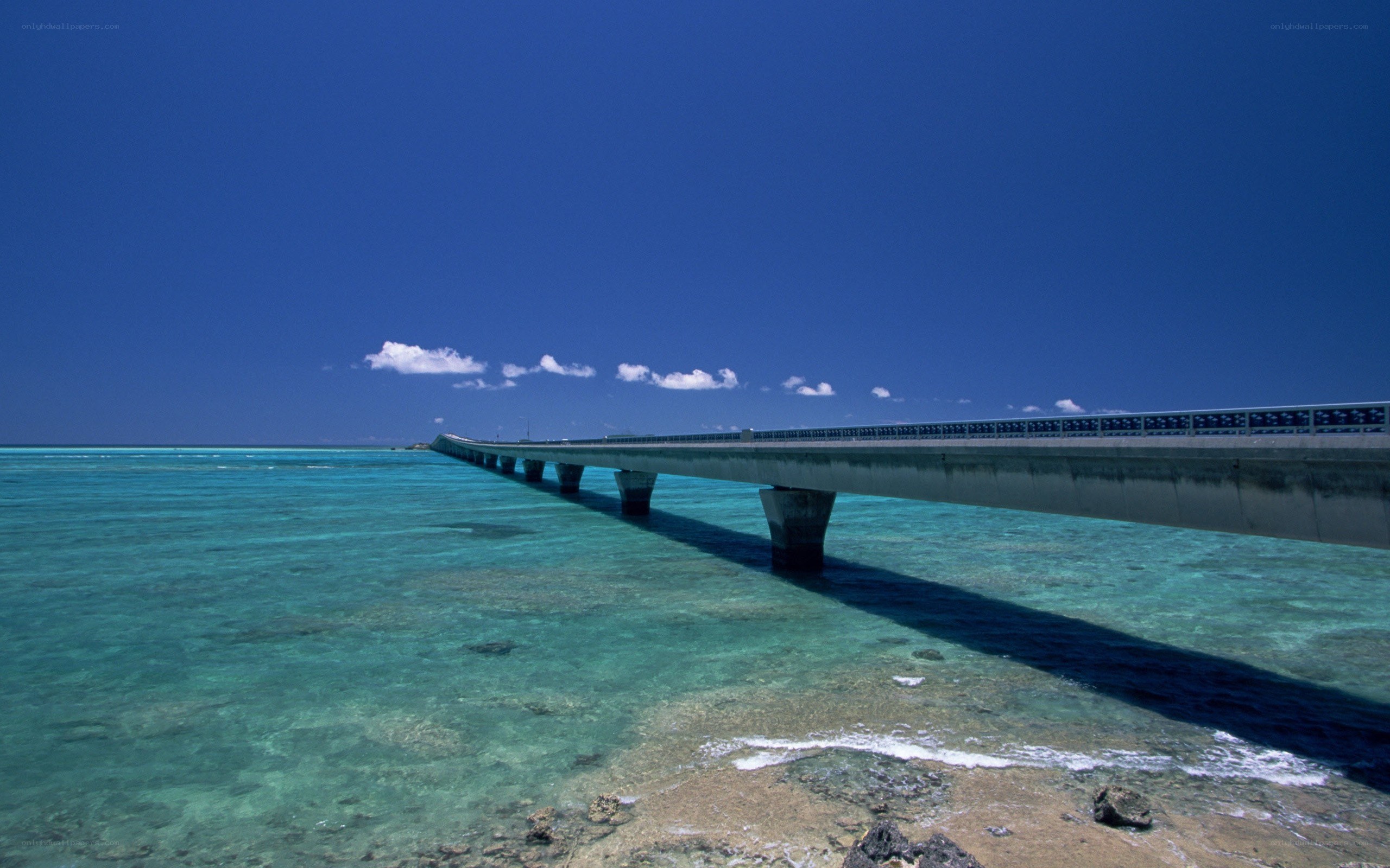 Bridge over turquoise water