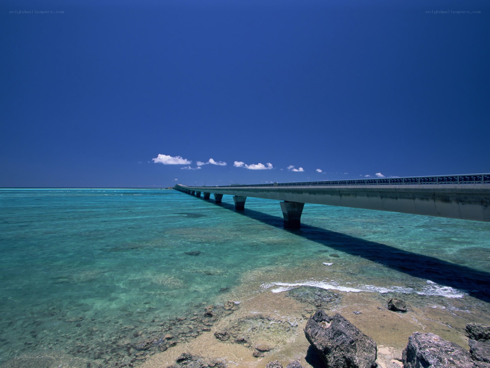 Bridge over turquoise water