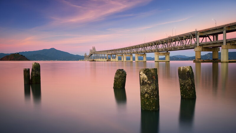 Bridge over Water at Dusk — Pink