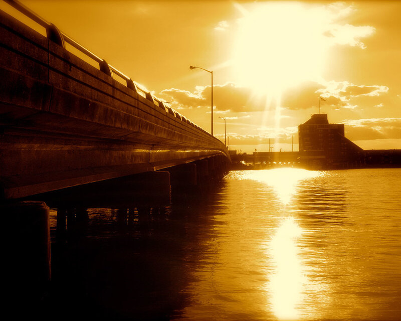 Bridge over Water at Sunset — Gold, Dramatic, Photograph, Sun, Building, Streetlight