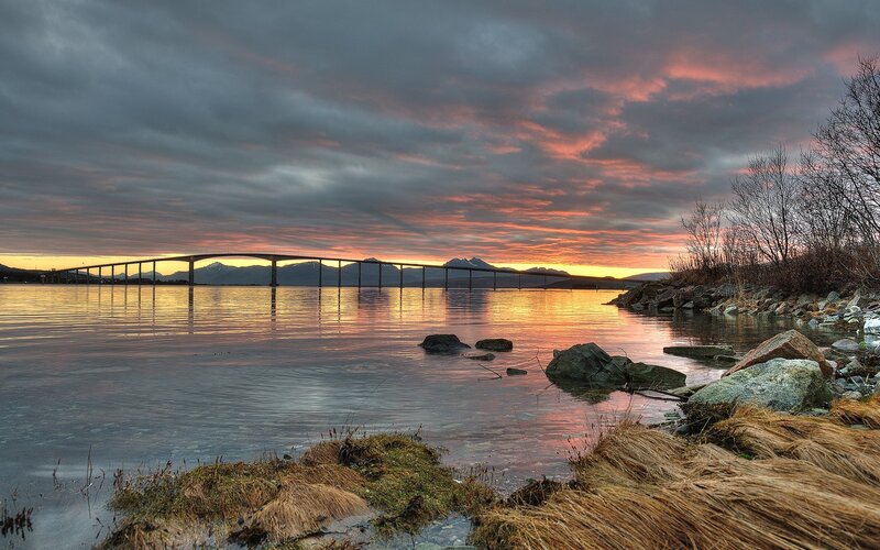 Bridge over Water at Sunset — Orange, Dramatic, Photograph, Mountains