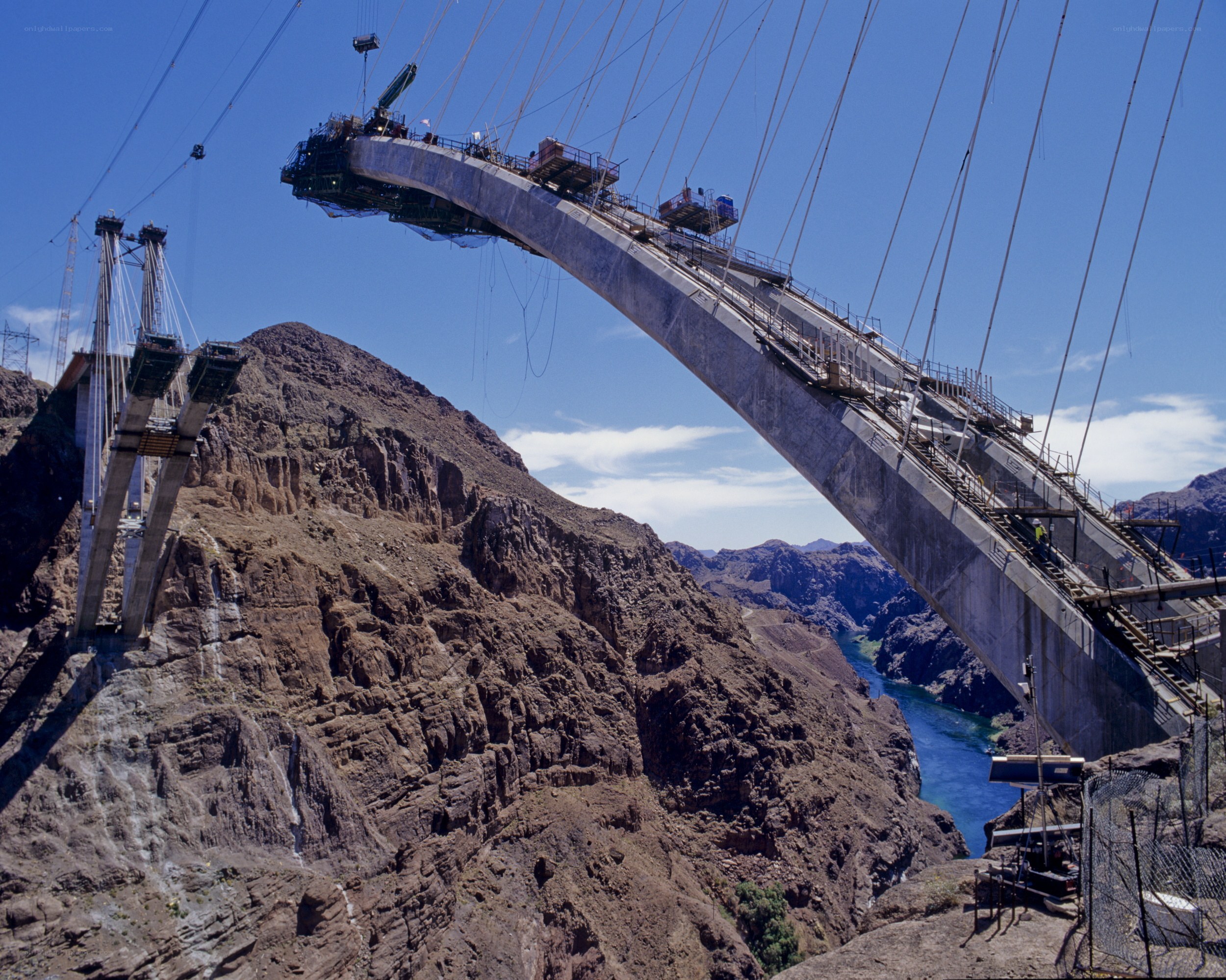 Bridge under construction over canyon