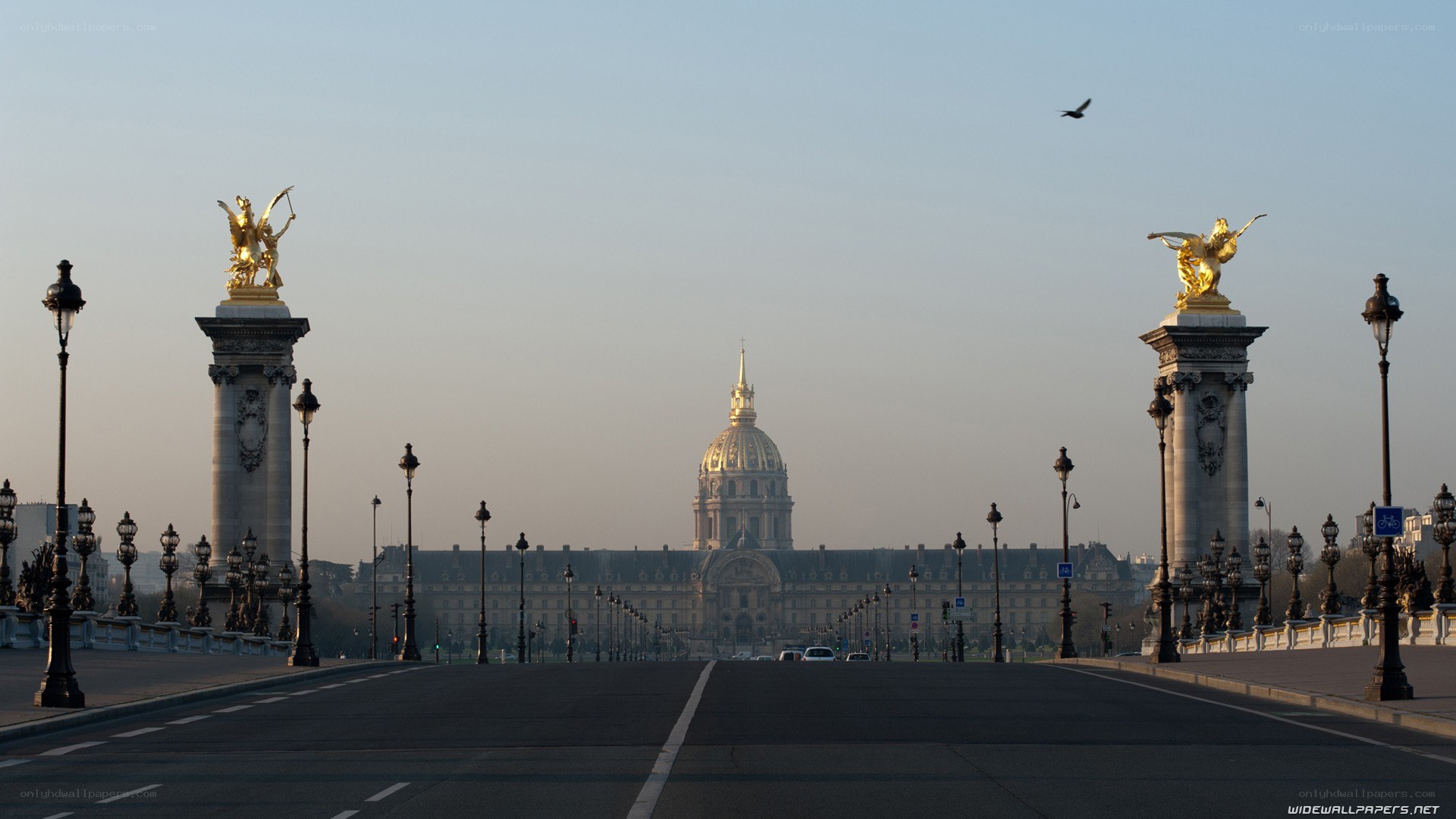 Bridge with golden statues and dome