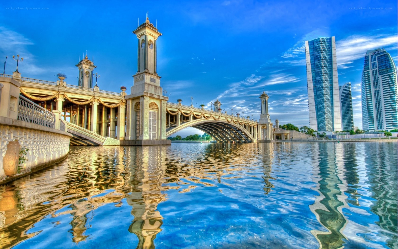 Bridges and skyscrapers at sunset