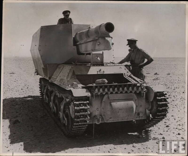 British soldiers with tank in desert