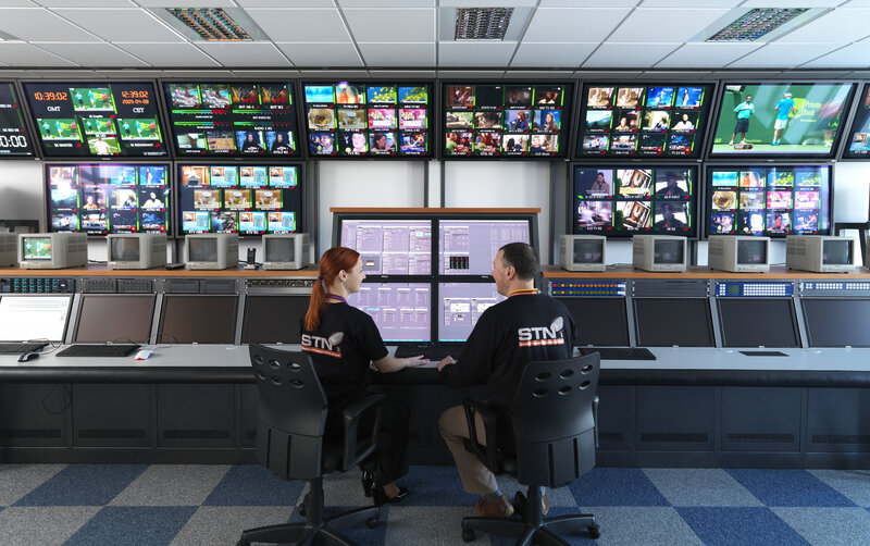 Broadcast control room with operators