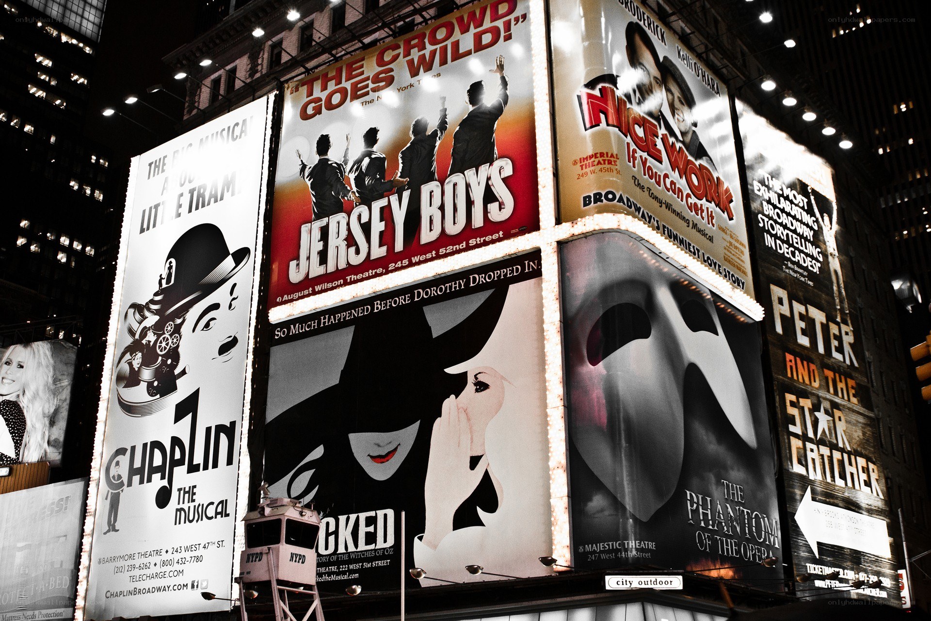Broadway theater billboards at night