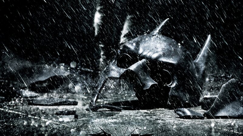 broken batman mask in rain