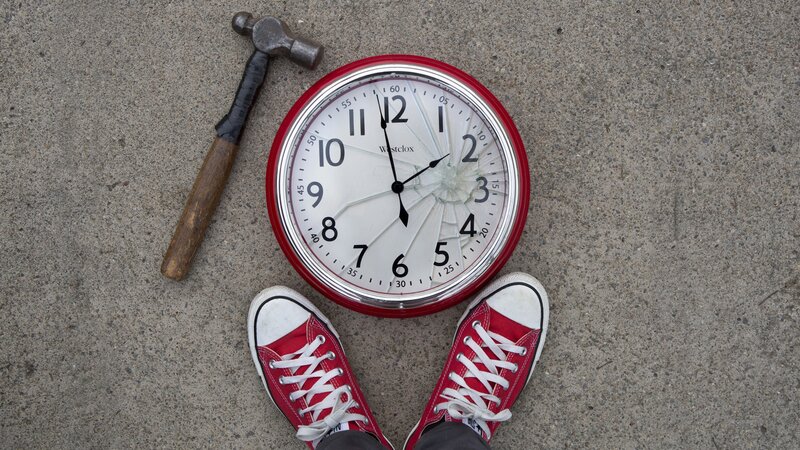 Broken Clock on Pavement