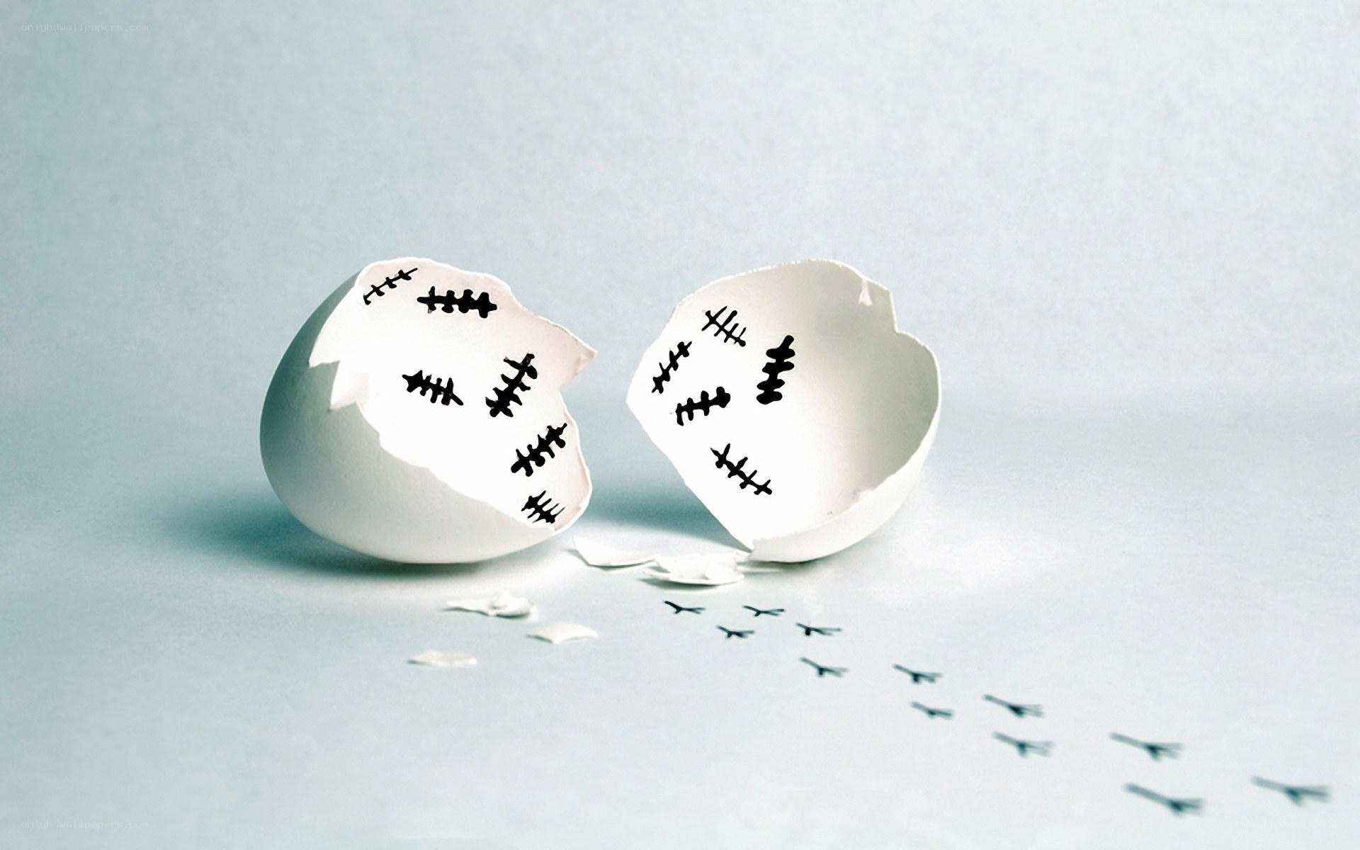 Broken egg with stitches