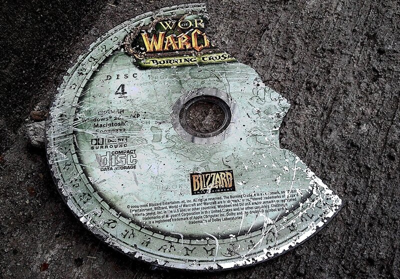 Broken Game Disc — Gray, Gritty, Photograph