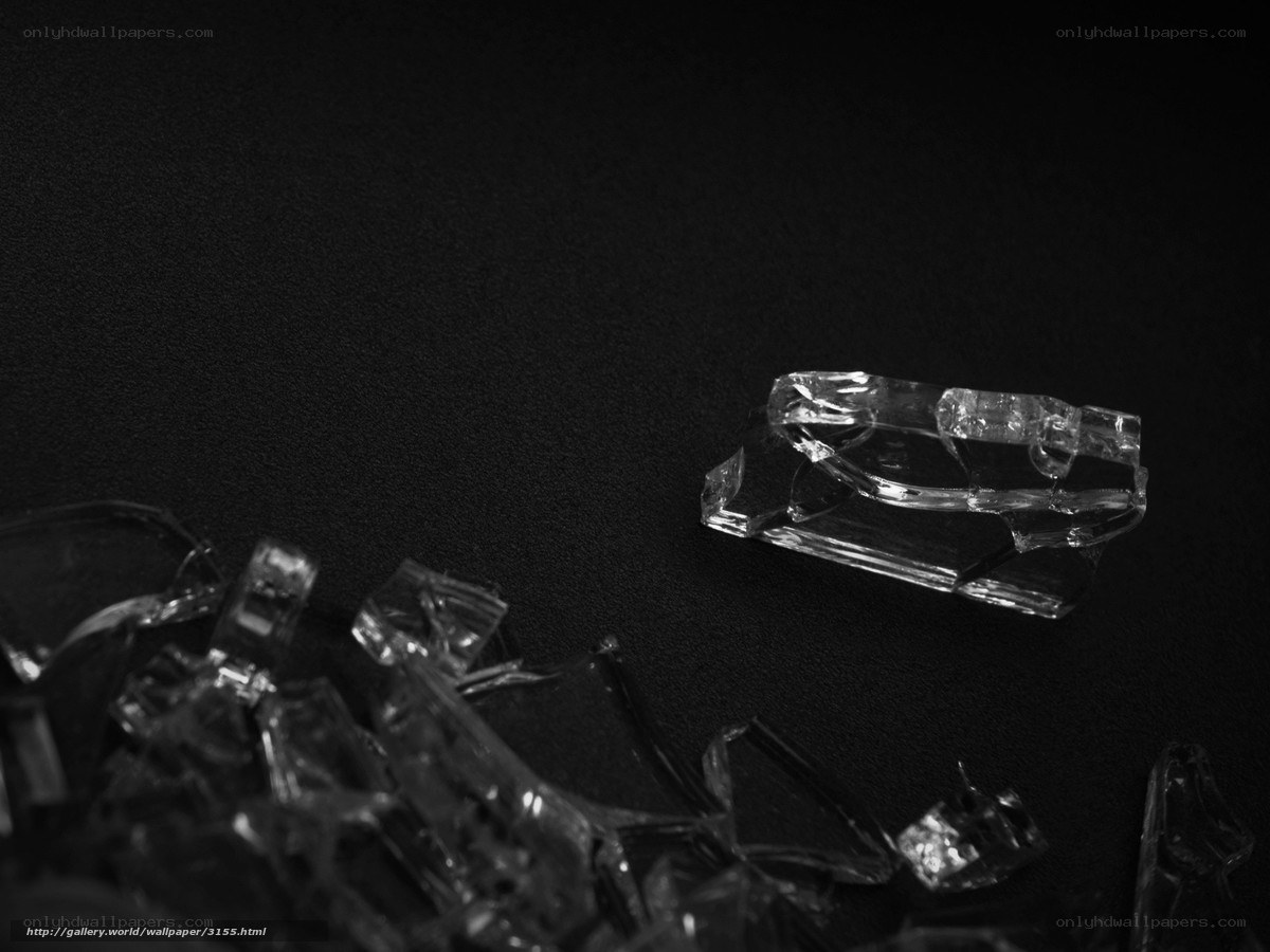 Broken glass on black background