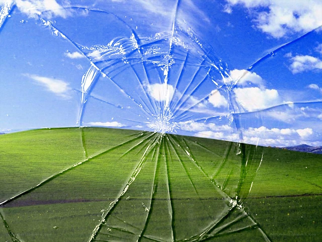 Broken glass over landscape