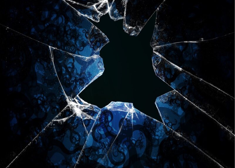Broken glass with blue pattern