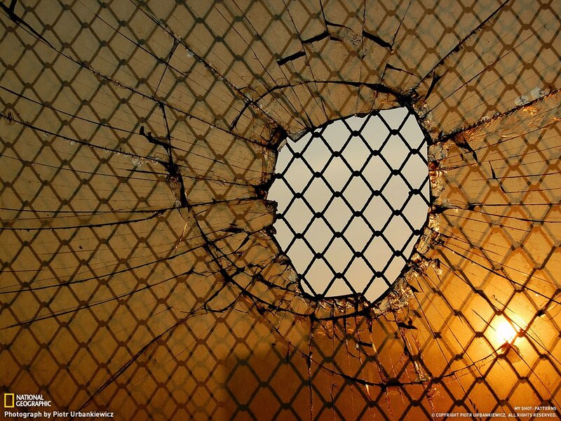 Broken glass with chain-link pattern