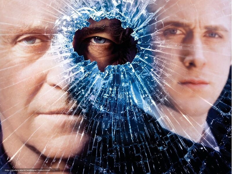 Broken glass with faces