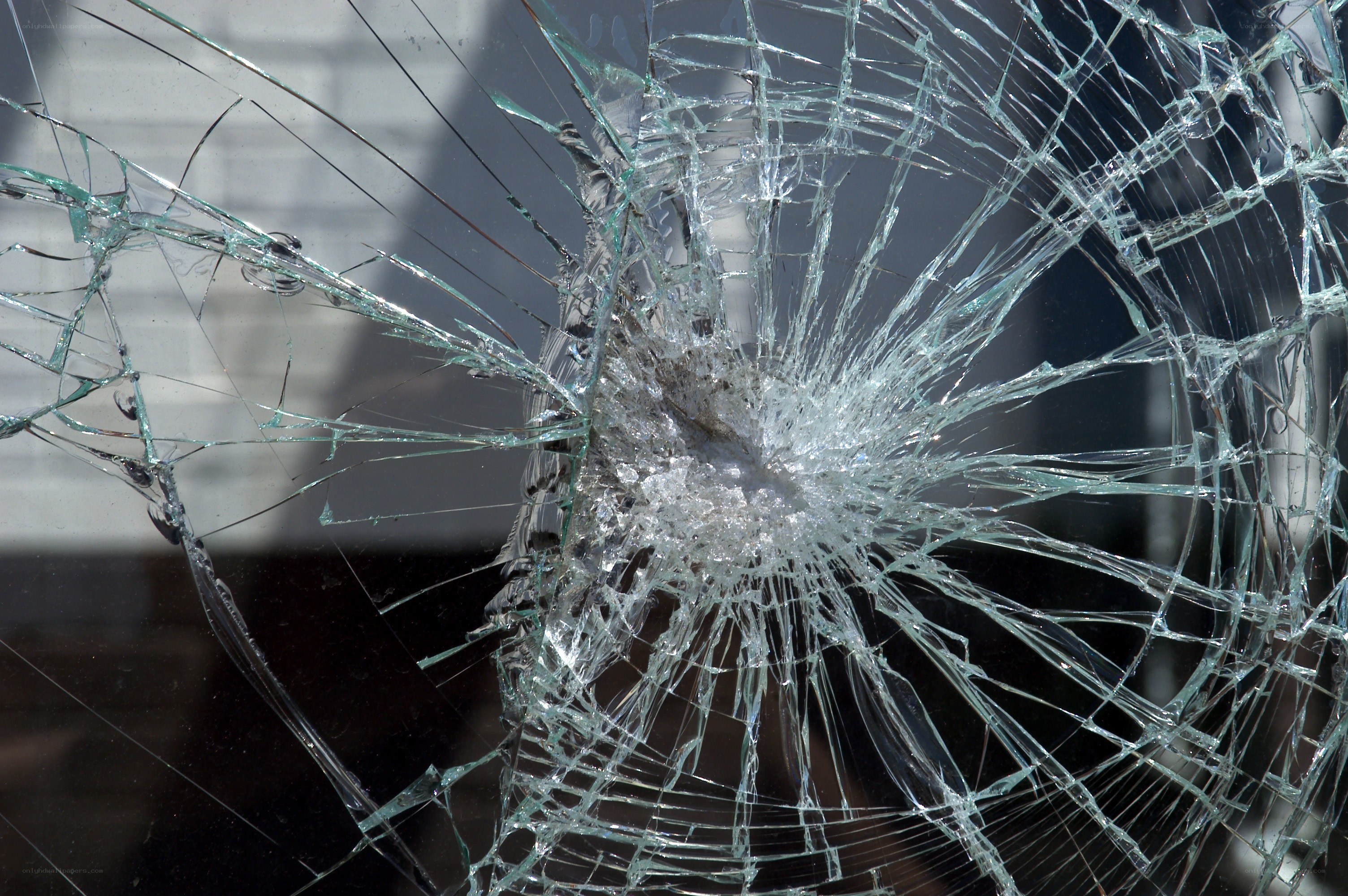 Broken glass with impact damage