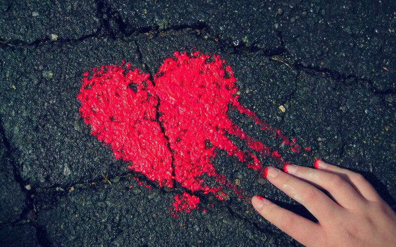 broken heart on pavement