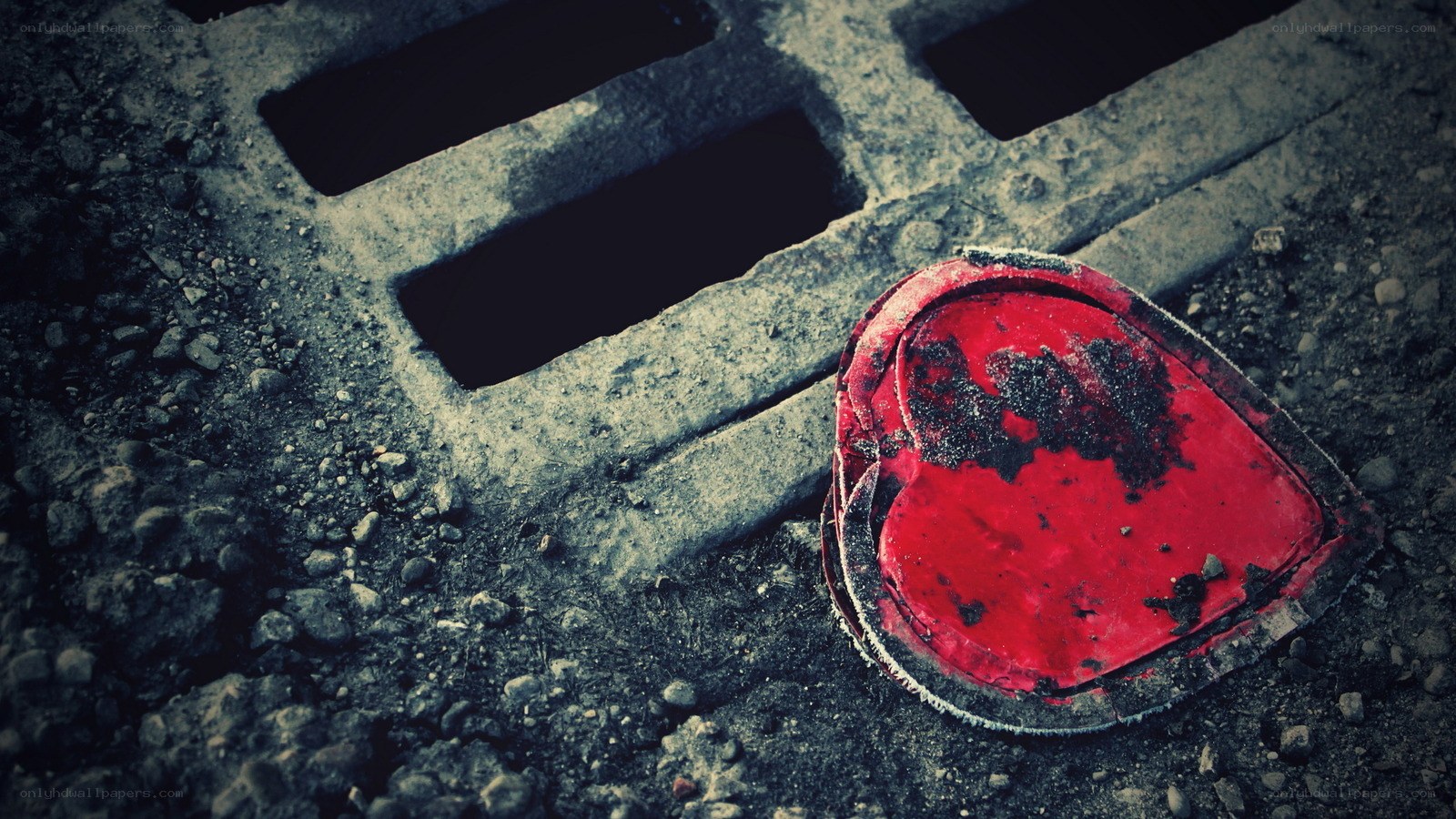 Broken heart on the ground