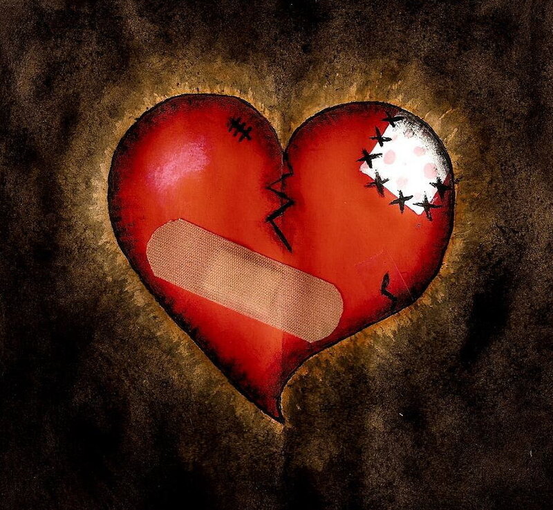 Broken heart with bandage
