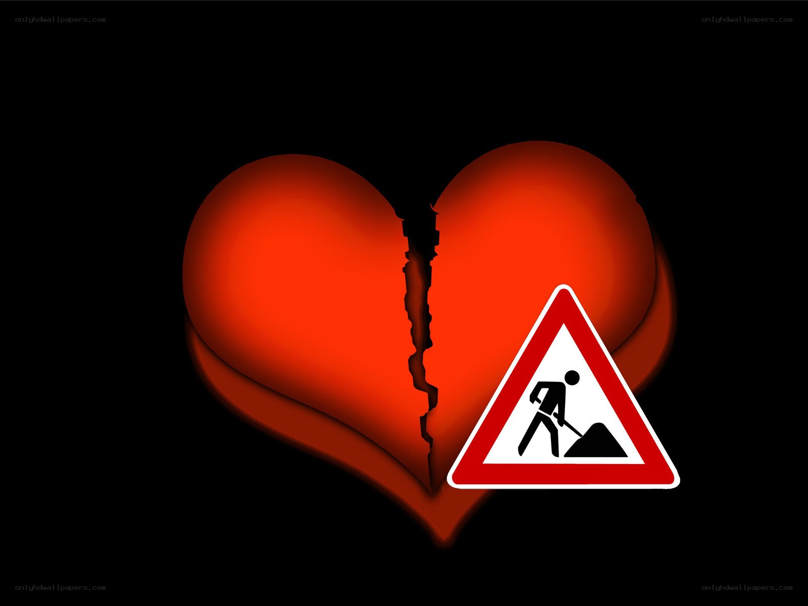 Broken heart with construction sign