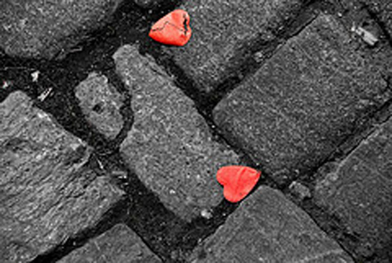 Broken hearts on pavement