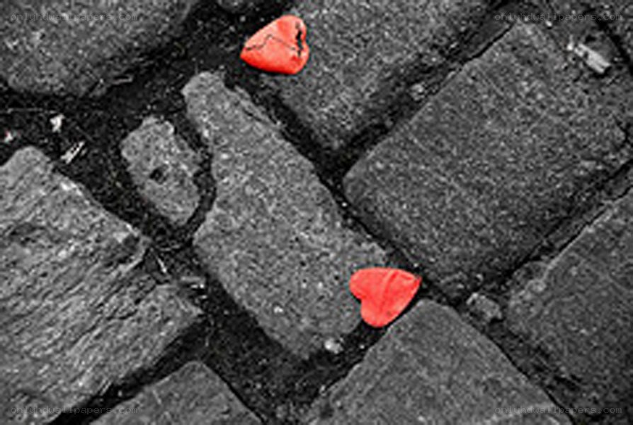 Broken hearts on pavement