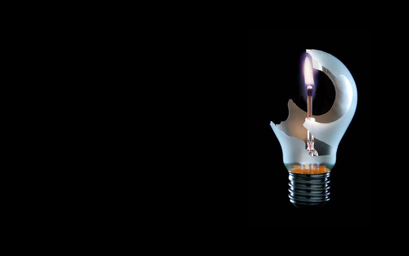 broken light bulb with match
