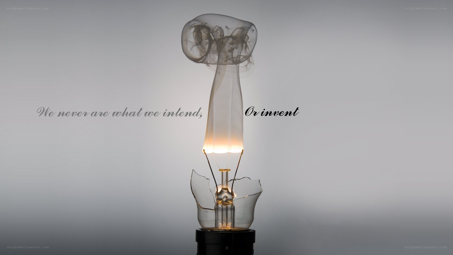 Broken light bulb with smoke