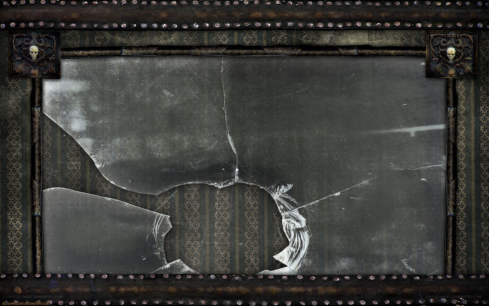 broken mirror with skull motifs