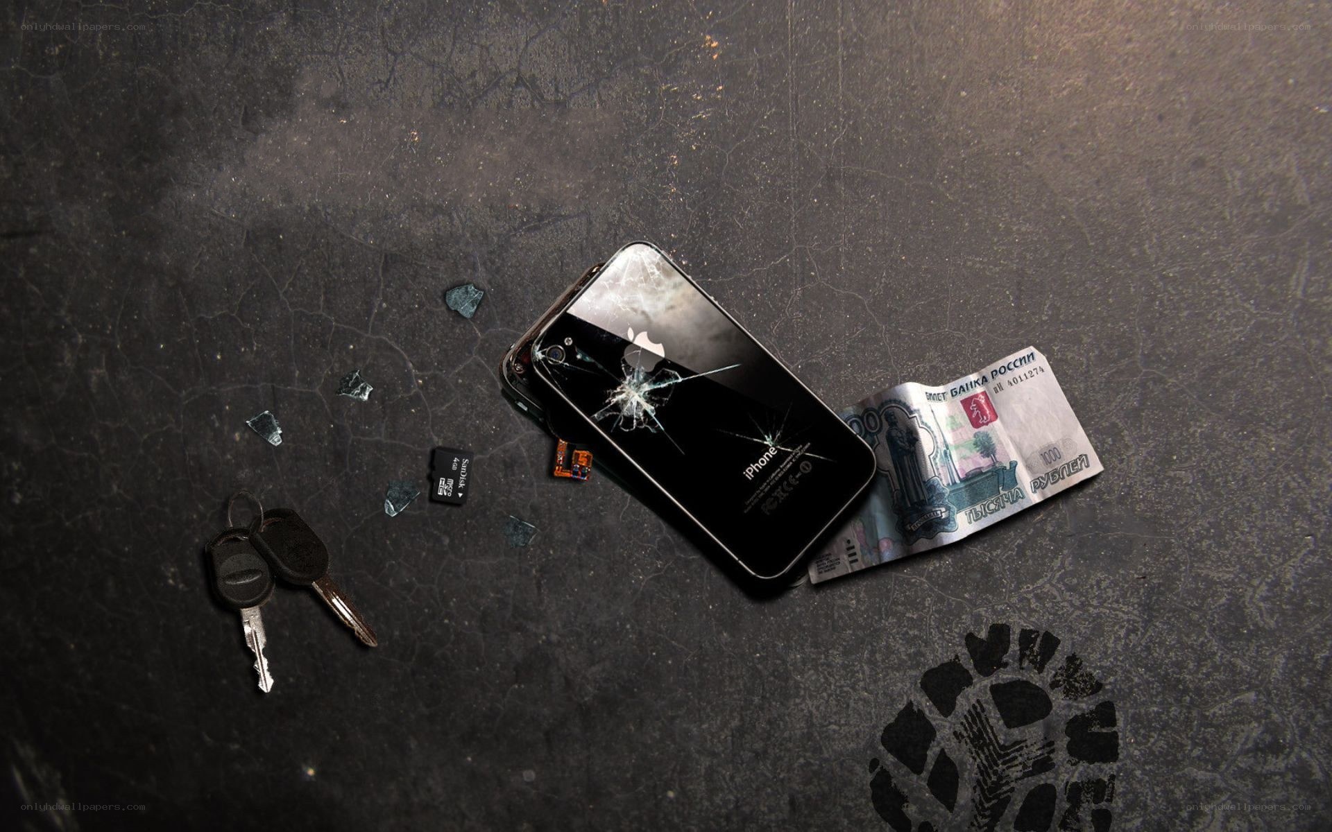 Broken phone and keys on floor