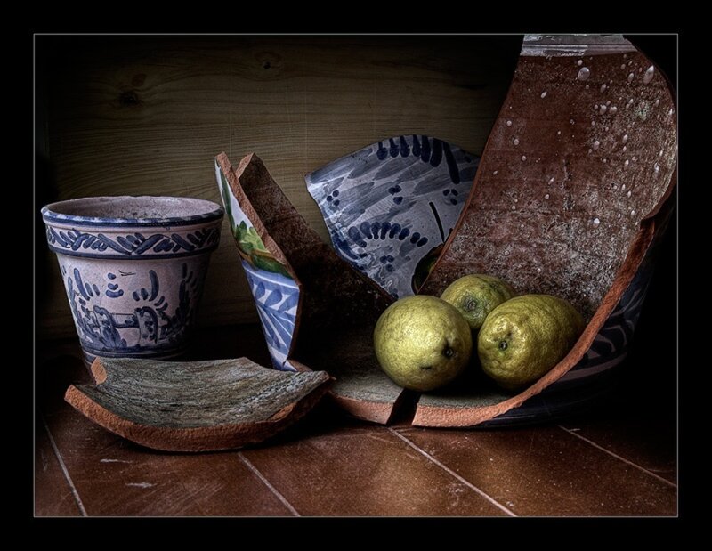 Broken pottery with lemons