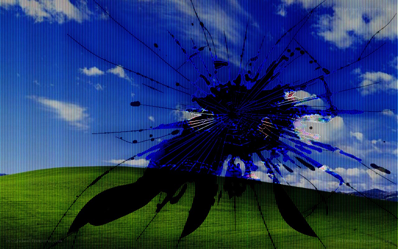 Broken screen with Windows XP wallpaper